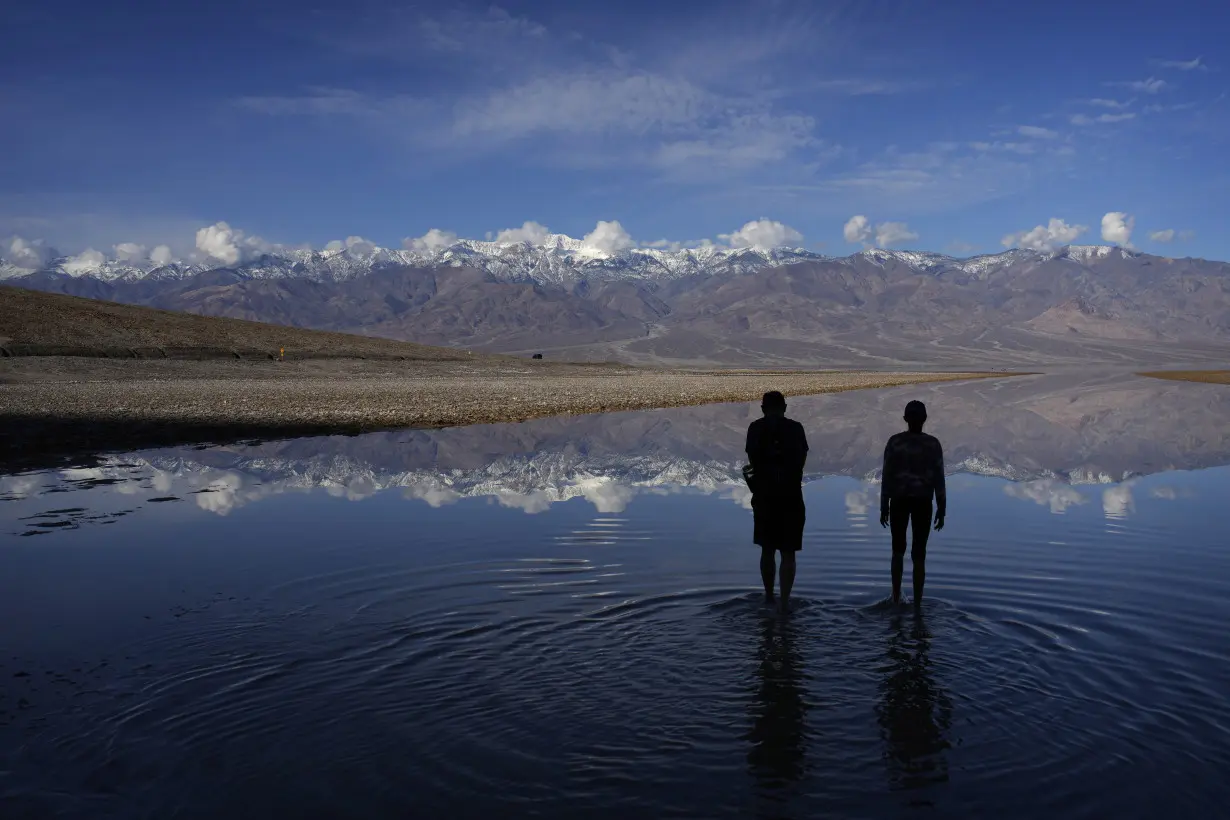 Kayakers paddle in Death Valley after rains replenish lake in one of Earth's driest spots