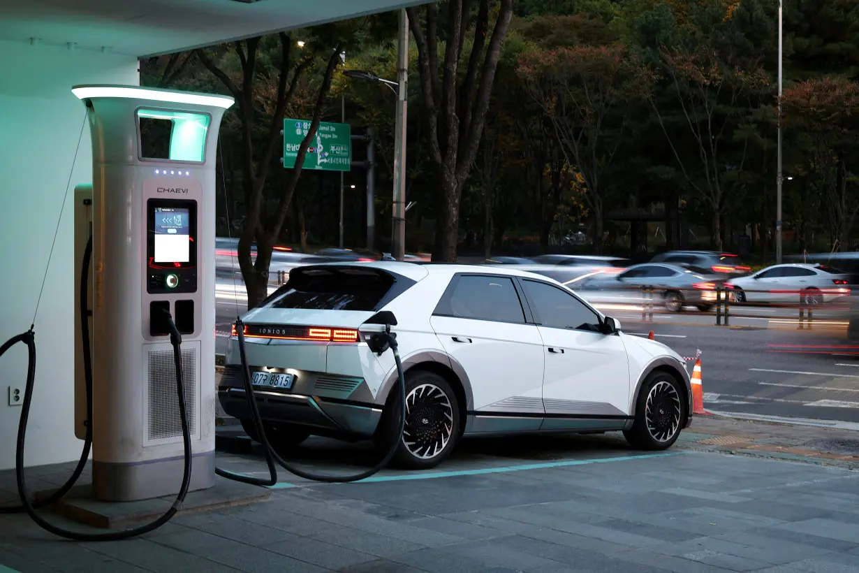 FILE PHOTO: A Hyundai Ioniq 5 electric vehicle is charged at Chaevi Stay Charging Station in Seoul