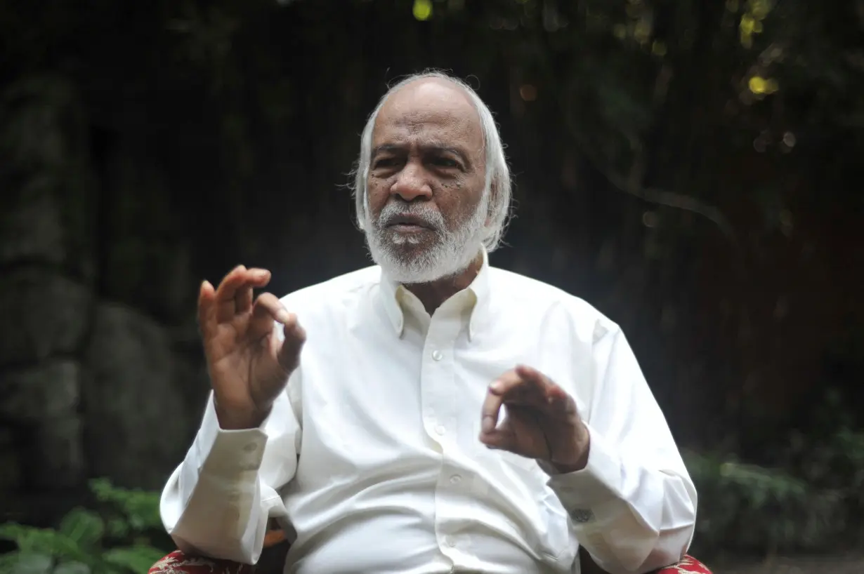 Bangladesh Nationalist Party’s Standing Committee member Abdul Moyeen Khan gestures during an interview with Reuters at his residence in Dhaka