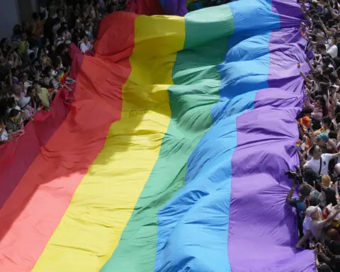 Lawmakers in Thailand pass a bill to legalize same-sex marriage by an overwhelming majority