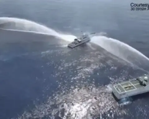 Chinese coast guard fires water cannons at Philippine vessels in the latest South China Sea incident
