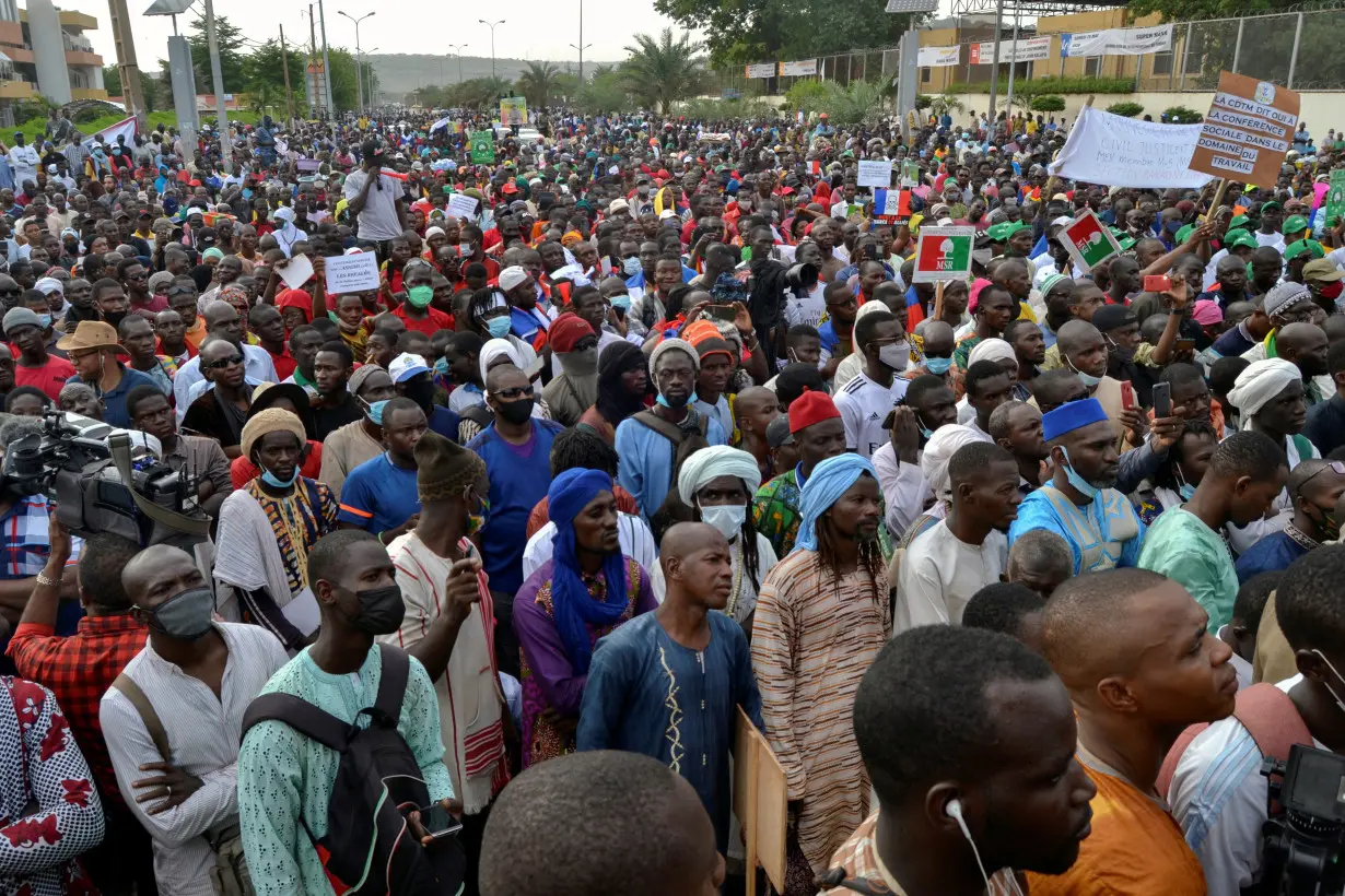 Supporters of Mali's M5-RFP opposition coalition, gather during a rally at the Independence Square in Bamako