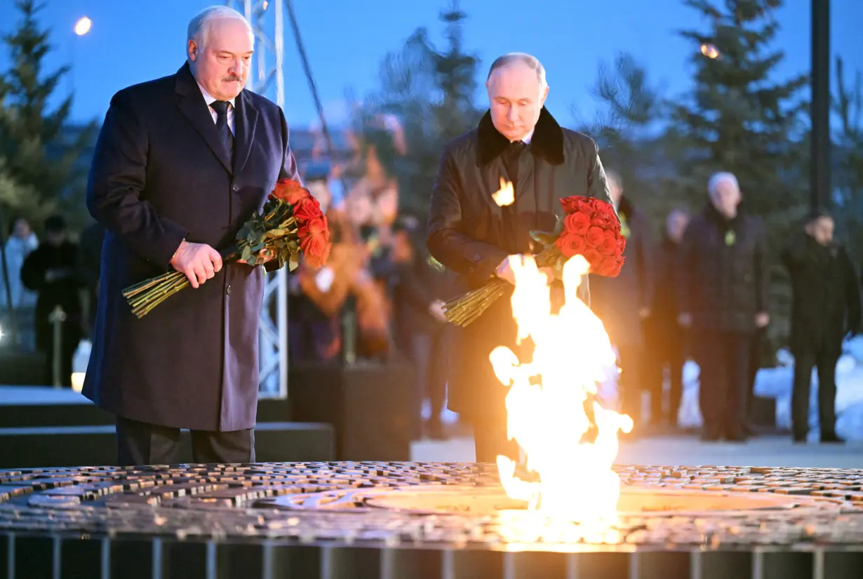 Russian President Putin and Belarusian President Lukashenko attend the opening ceremony of a monument to the victims of World War Two in Leningrad region