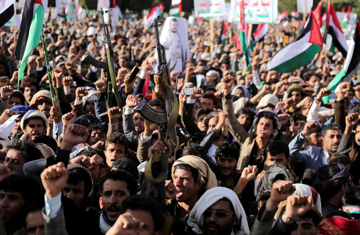 FILE PHOTO: Houthi supporters rally after U.S. and Britain carry out strikes against Houthis