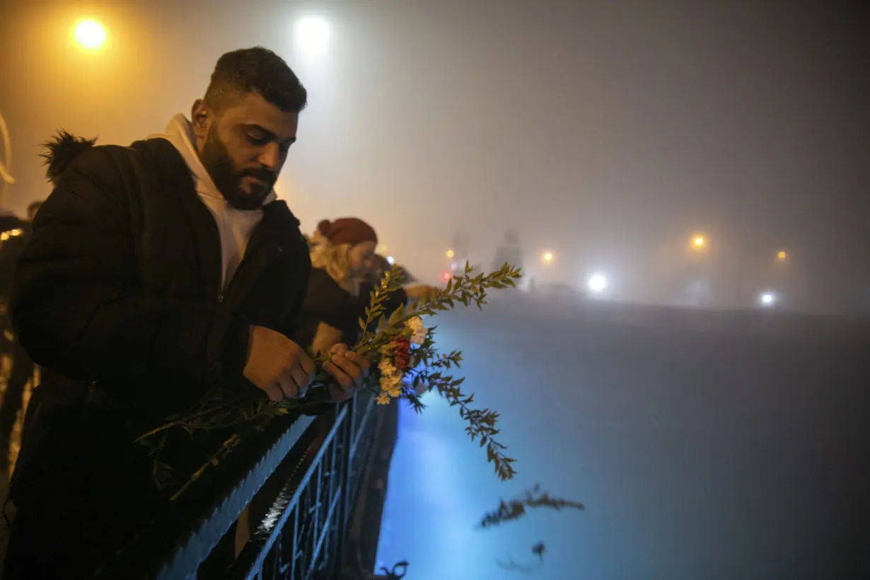 Turkey mourns tens of thousands dead, surrounded by the ruins of last year's earthquake