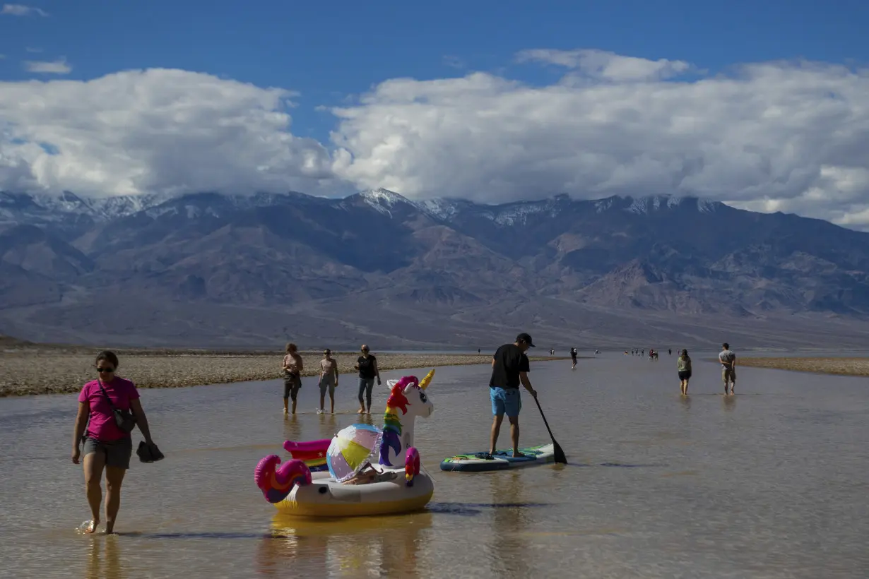 Kayakers paddle in Death Valley after rains replenish lake in one of Earth's driest spots