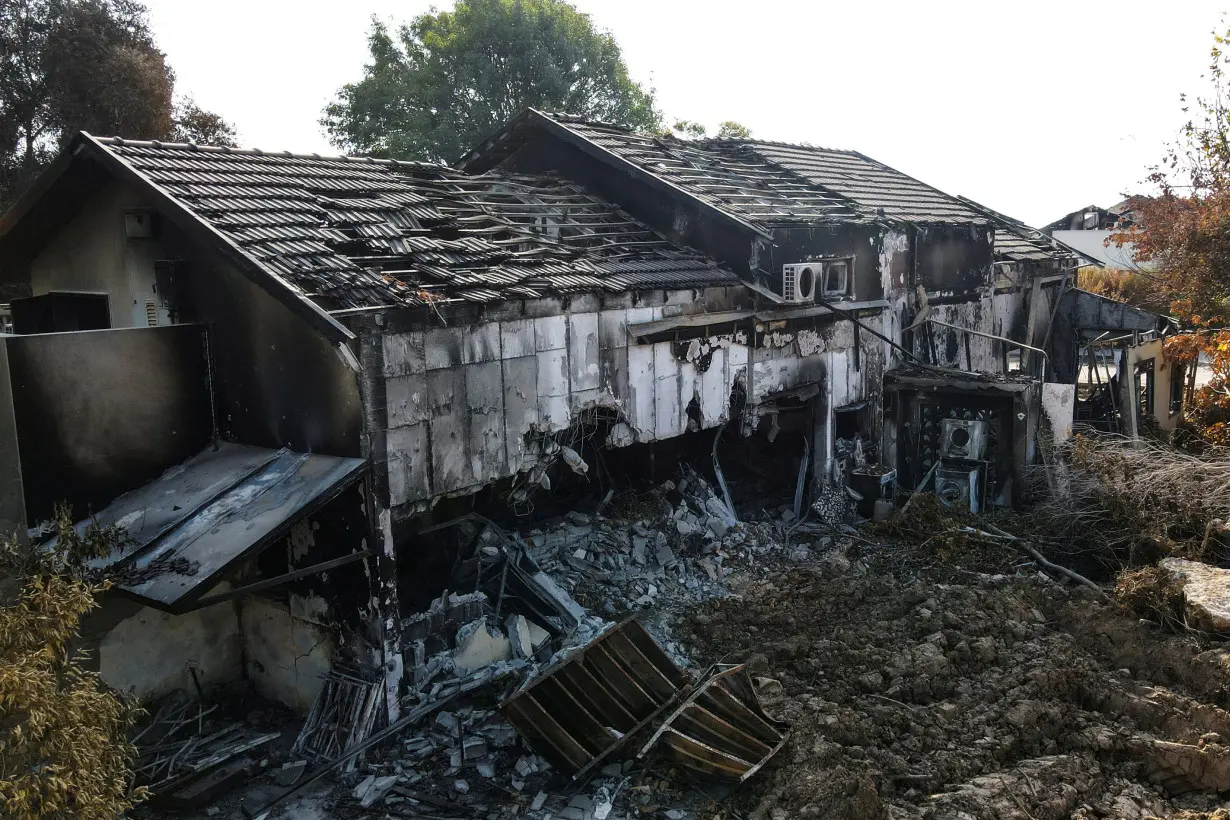 Aftermath of a deadly infiltration by Hamas gunmen from Gaza Strip, in Kibbutz Beeri