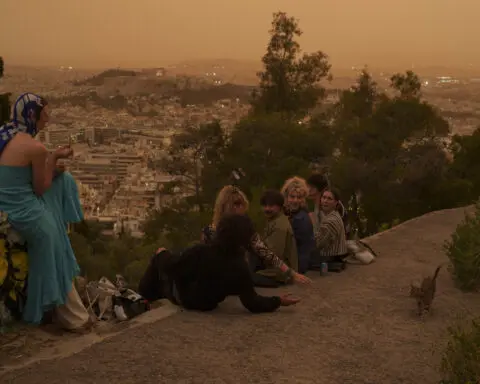 Martian skies over Athens? Greece's capital turns an orange hue with dust clouds from North Africa