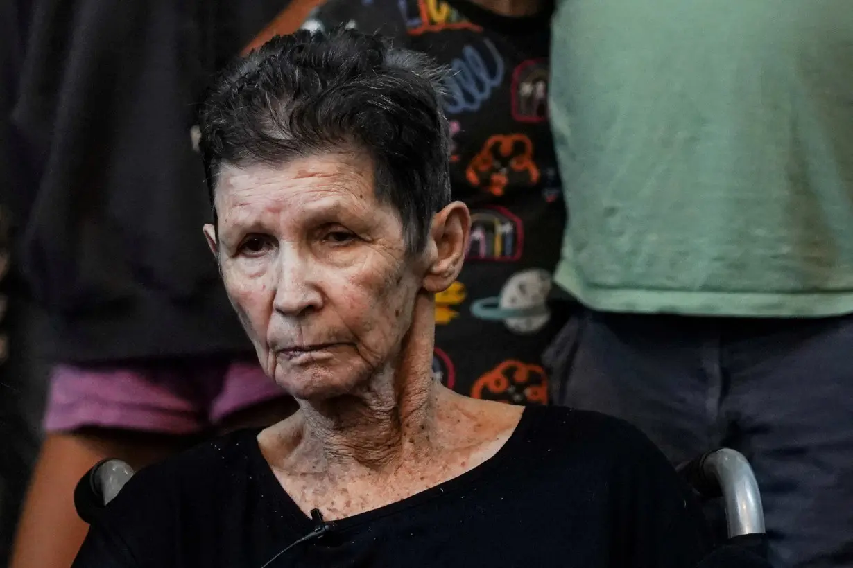 FILE PHOTO: Hostage, Lifshitz, speaks to members of the press after being released by Hamas militants, at Ichilov Hospital in Tel Aviv