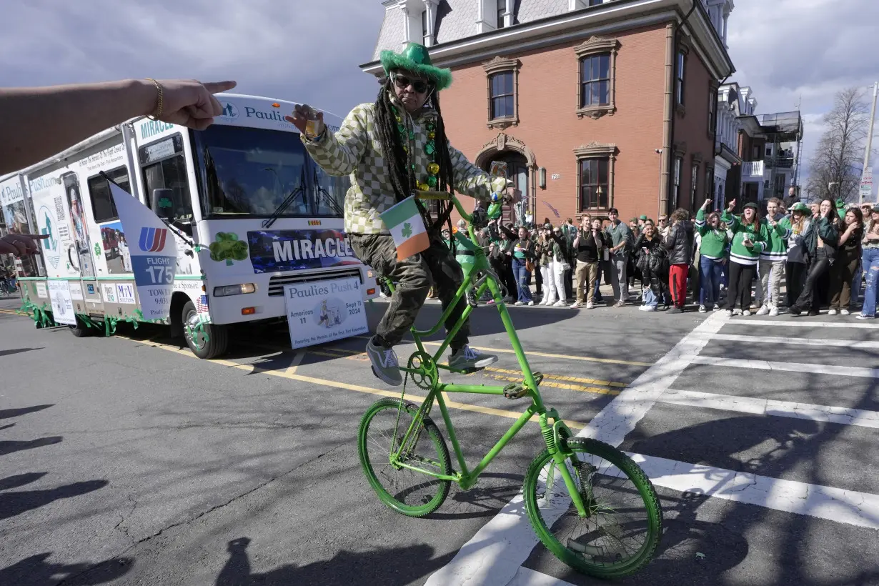 AP PHOTOS: Boston celebrates St. Patrick's Day; Biden holds White House brunch with Irish leader