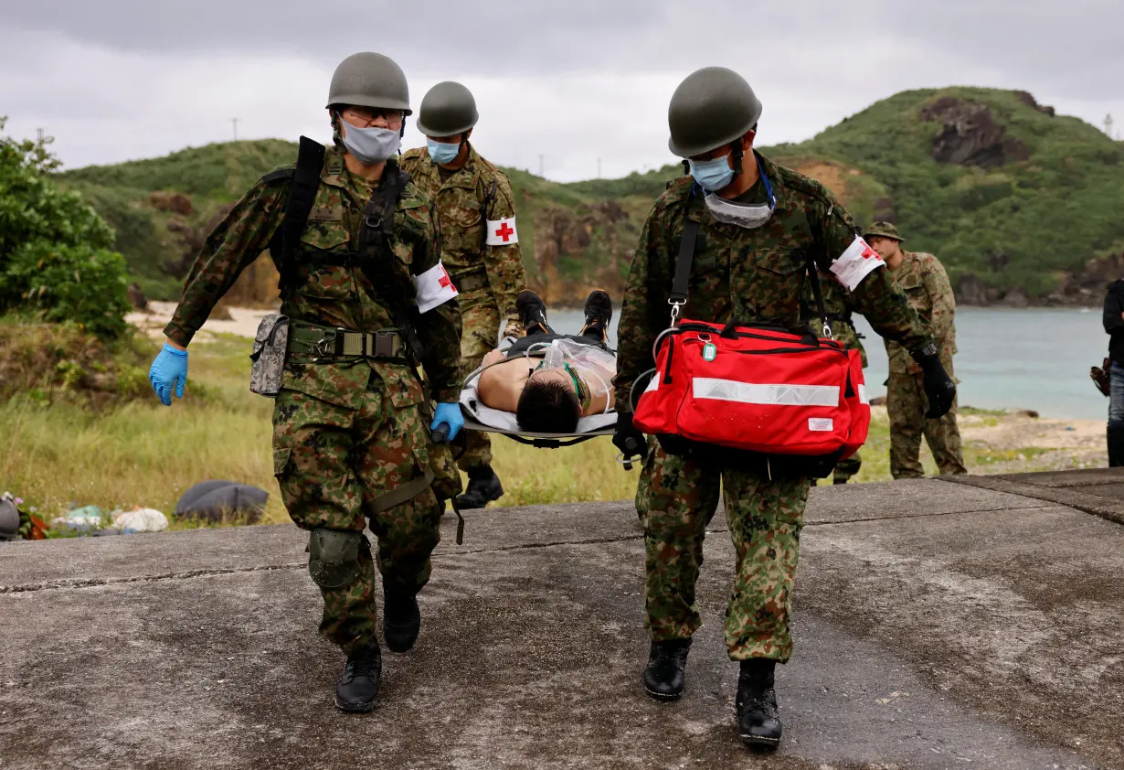 Japan Self-Defense Forces soldiers take part in an evacuation drill on Yonaguni island, Okinawa