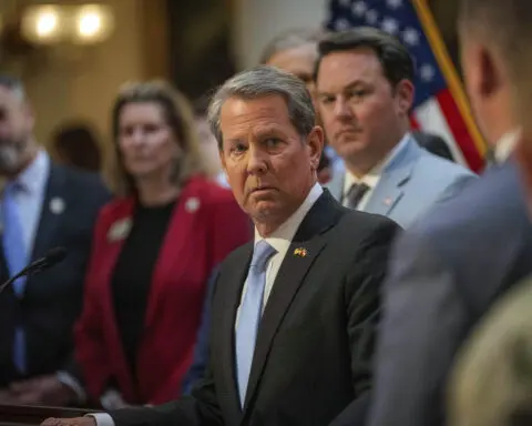 Georgia Republican Gov. Brian Kemp sets the stage to aid Texas governor's border standoff with Biden