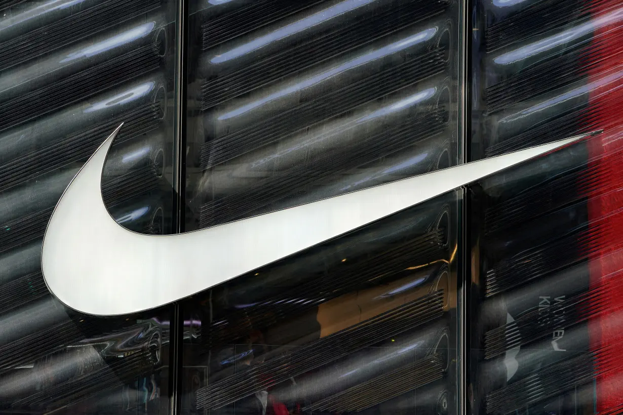 FILE PHOTO: The Nike swoosh logo is seen outside the store on 5th Ave in New York