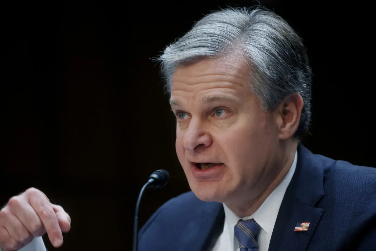 FILE PHOTO: FBI Director Wray testifies on Capitol Hill in Washington, U.S.