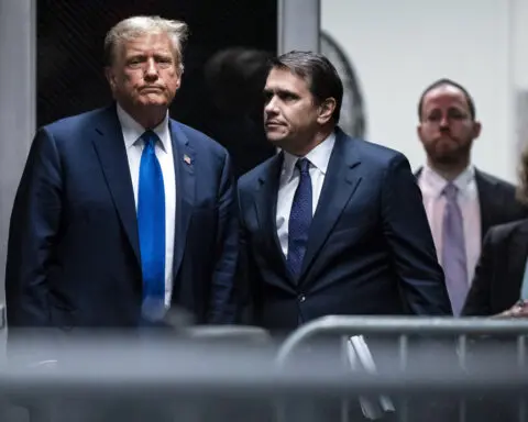 Trump loses bid to halt Jan. 6 lawsuits while he fights criminal charges in the 2020 election case