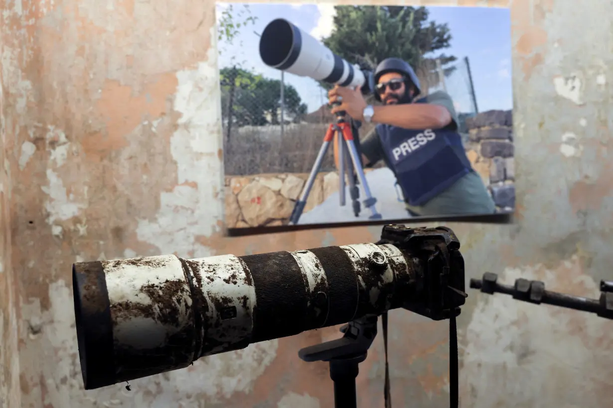 The camera that belonged to Reuters journalist Issam Abdallah is displayed during a press conference by Amnesty International and Human Rights Watch in Beirut