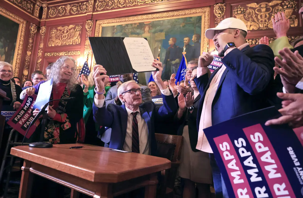 LA Post: Wisconsin’s Democratic governor signs his new legislative maps into law after Republicans pass them