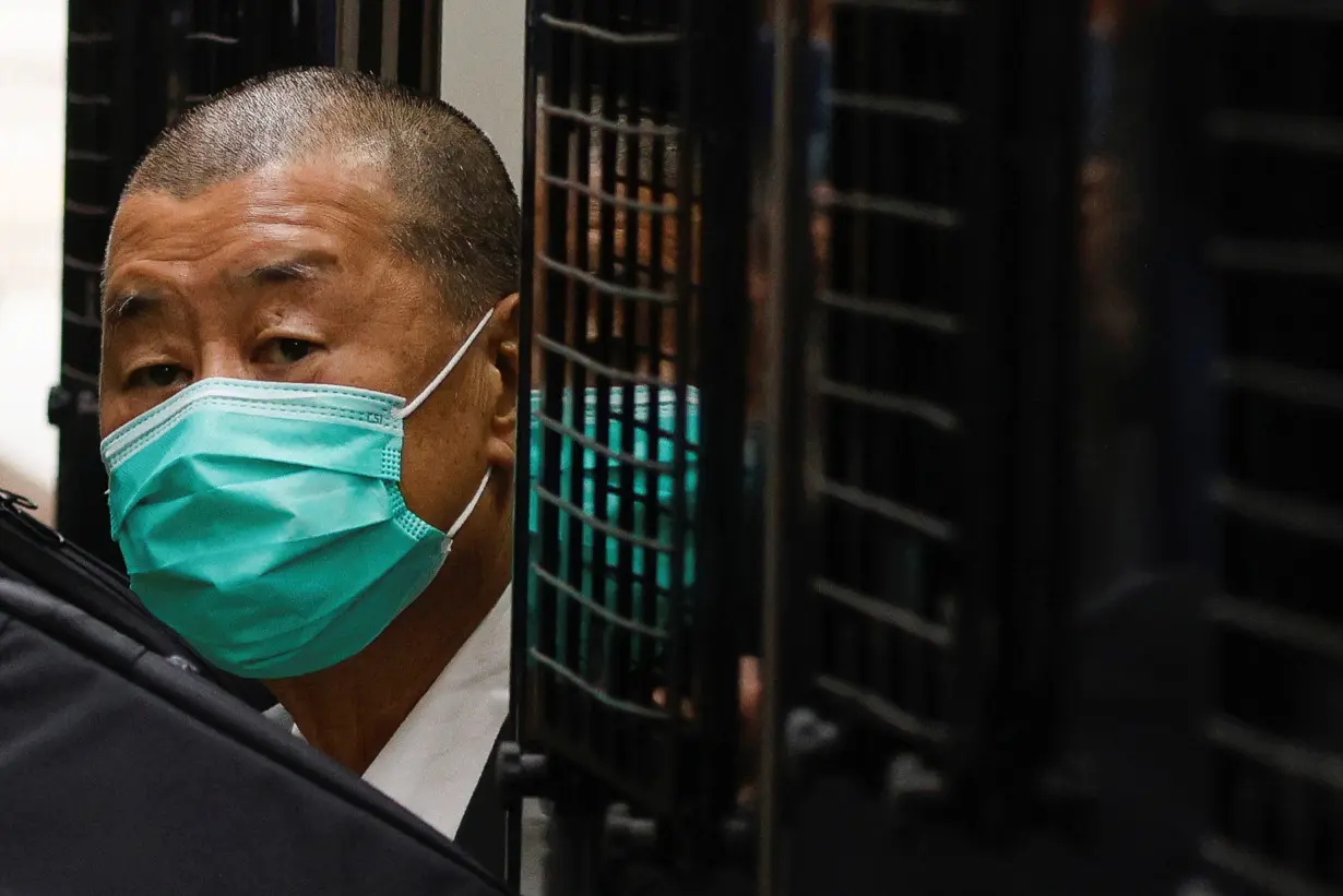 FILE PHOTO: Media mogul Jimmy Lai, founder of Apple Daily, arrives the Court of Final Appeal by prison van in Hong Kong