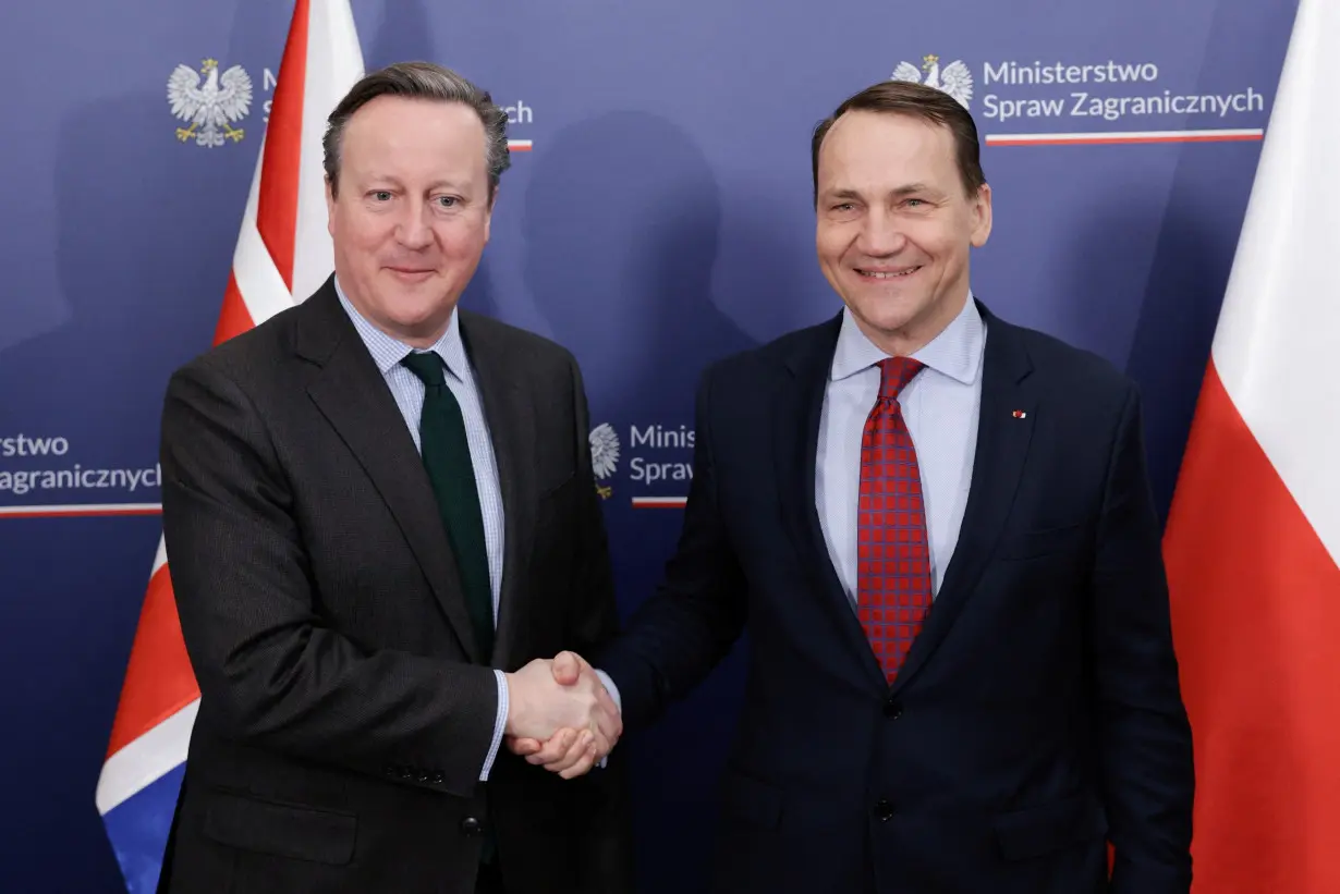 Poland’s Foreign Minister Sikorski meets with his British counterpart Cameron in Warsaw