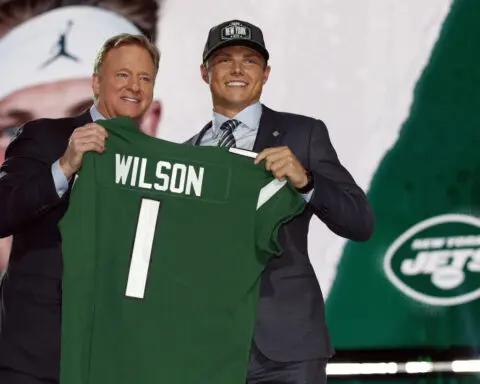 Jets trade quarterback Zach Wilson to the Broncos, AP source says