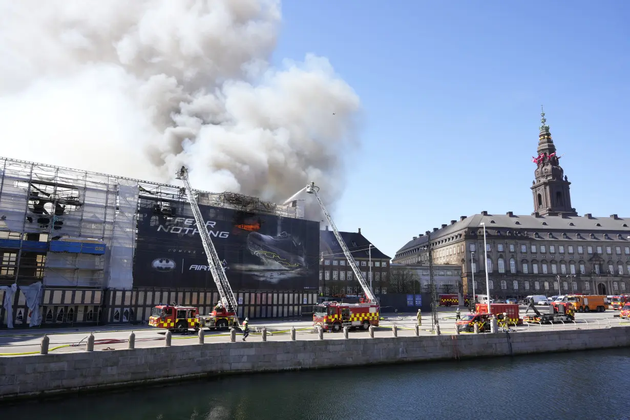 Copenhagen fights the last pockets of a fire that destroyed a 400-year-old landmark