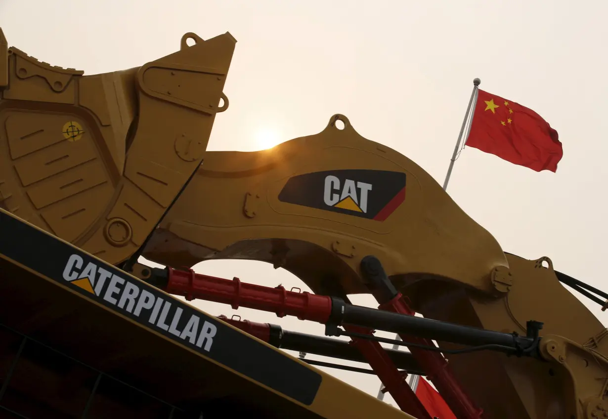 A Caterpillar excavator is displayed at the China Coal and Mining Expo 2013 in Beijing