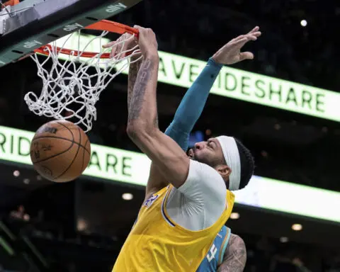 Anthony Davis has 3rd career triple-double, Lakers beat Hornets 124-118