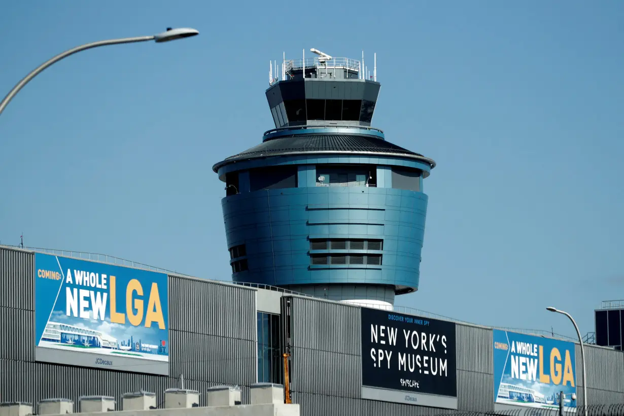 FILE PHOTO: The control tower at LaGuardia Airport in New York City is seen after after hundreds of flights were delayed or grounded in New York