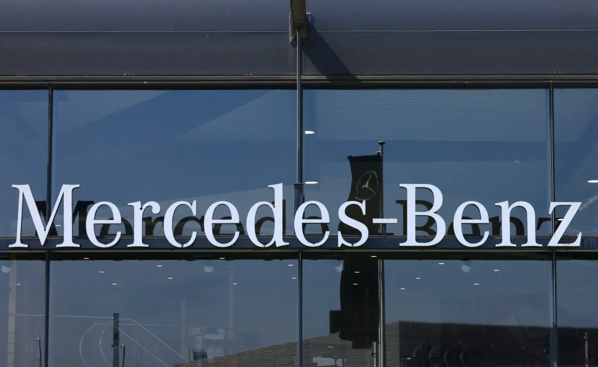 FILE PHOTO: The logo of Mercedes-Benz is seen outside a Mercedes-Benz car dealer in Brussels