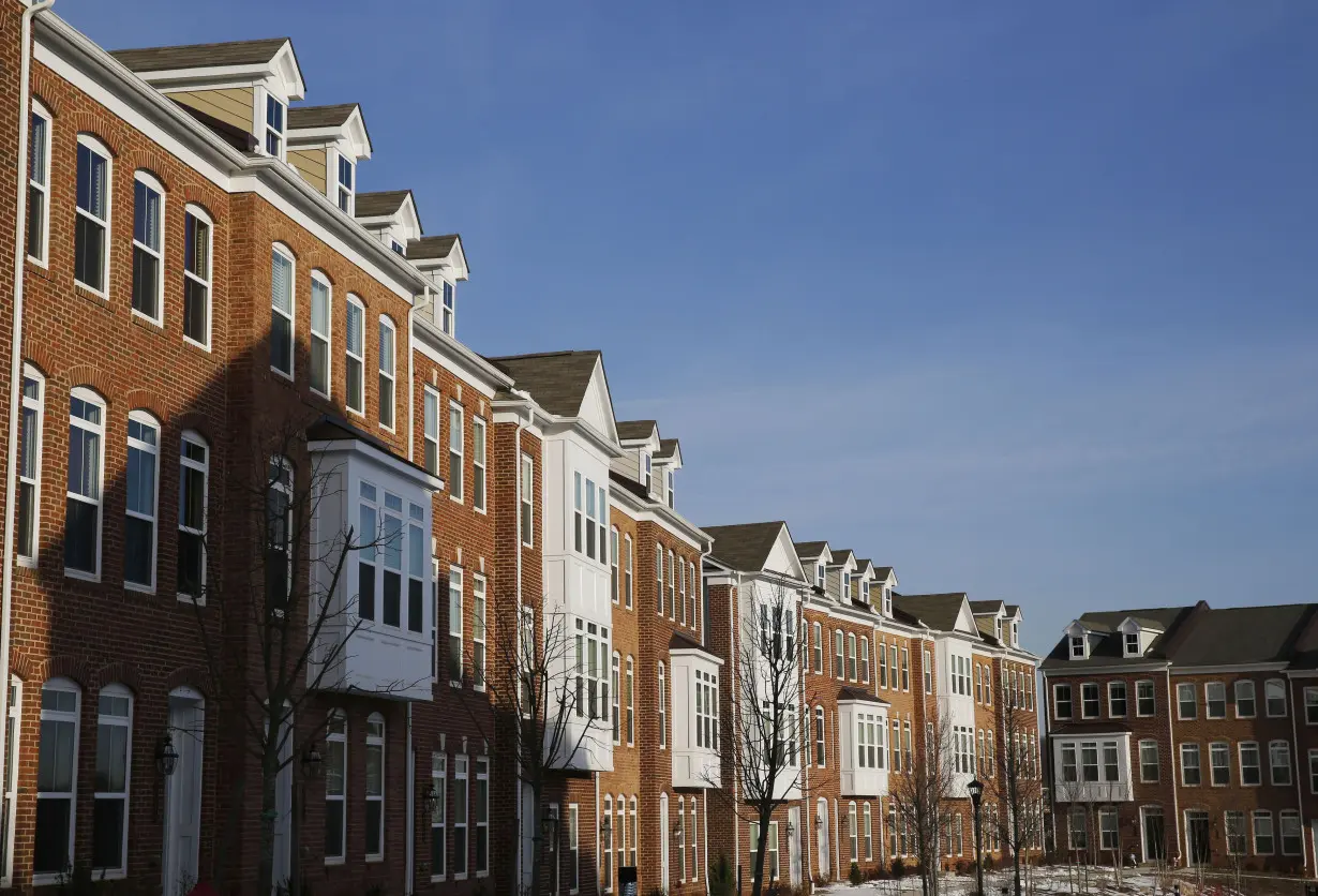 Townhomes line a street in Fairfax, on the morning the National Association of Realtors issues its Pending Home Sales for February report, in Virginia