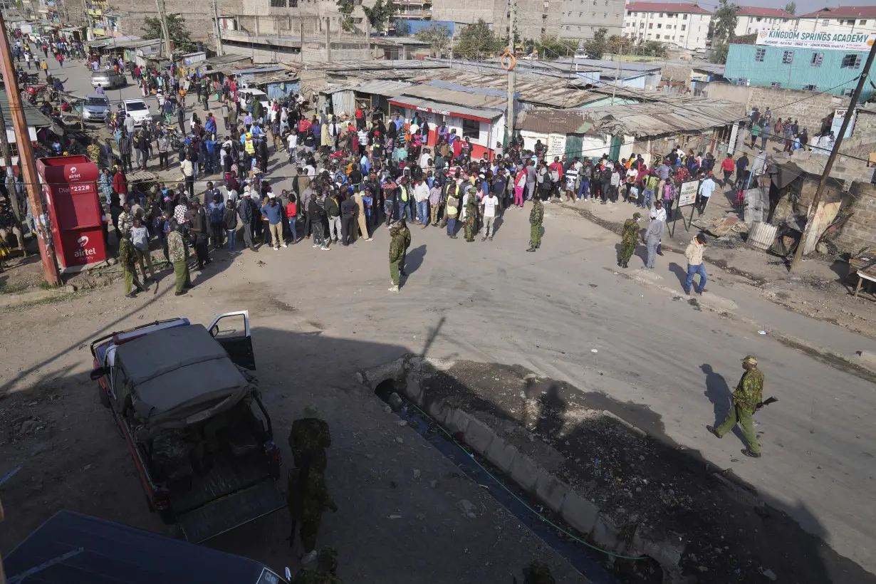 Gas explosions in Kenya's capital send smoke rising over homes and injure 29