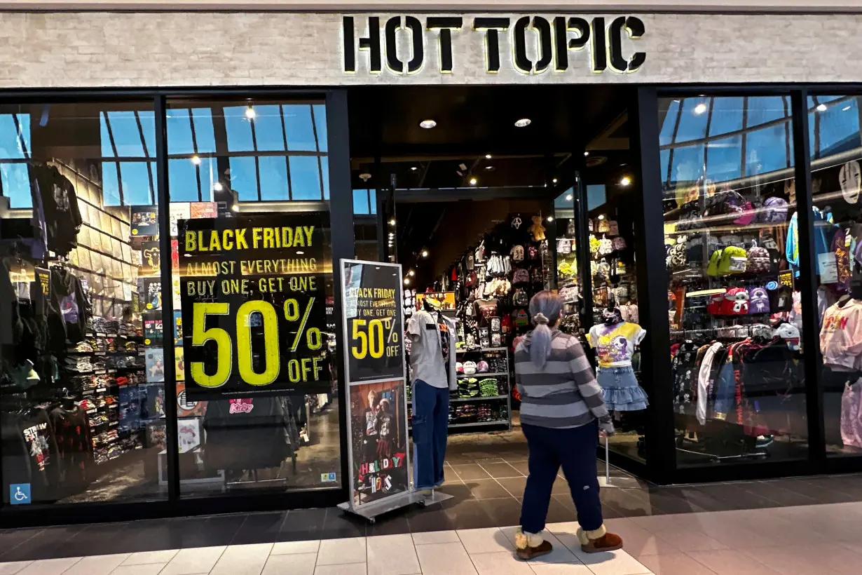 FILE PHOTO: A shopper enters the Hot Topic store during Black Friday deals at the Roosevelt Field mall in Garden City