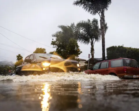 Second atmospheric river in days churns through California, knocking out power and flooding roads