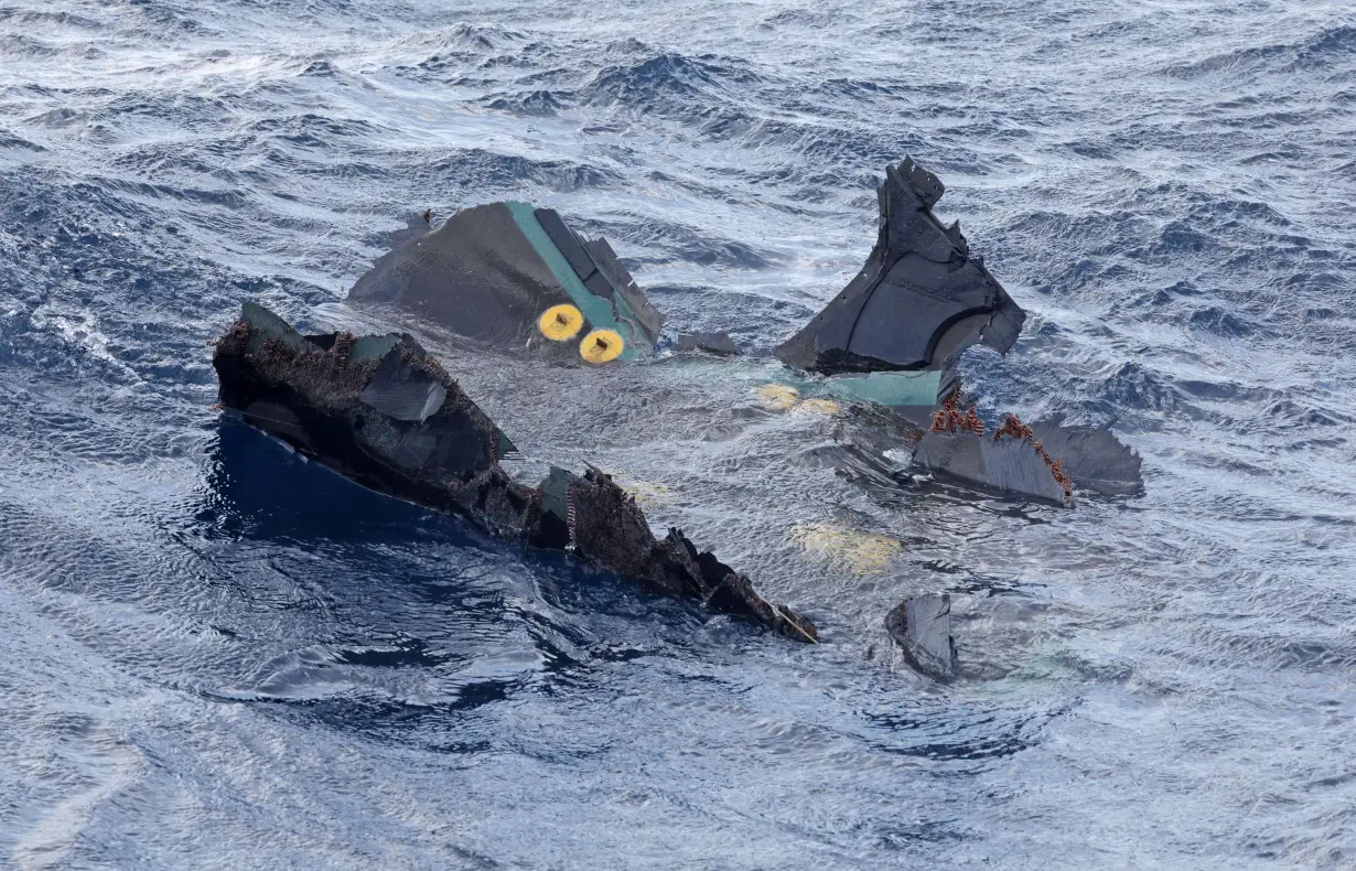 A floating object believed to belong to the U.S. military aircraft V-22 Osprey that crashed into the sea is seen off Yakushima Island