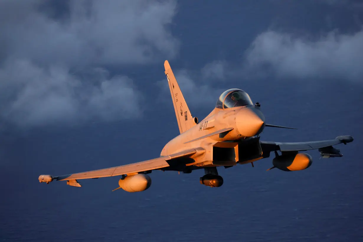 FILE PHOTO: A Eurofighter EF-2000 fighter aircraft of the Spanish Air Force flies during the Ocean Sky 2023 Military Exercise