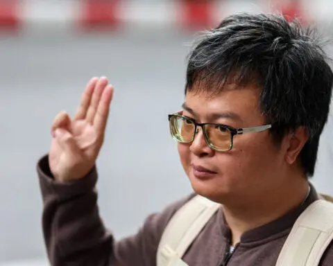 Thai court adds jail time for rights lawyer who urged monarchy reform