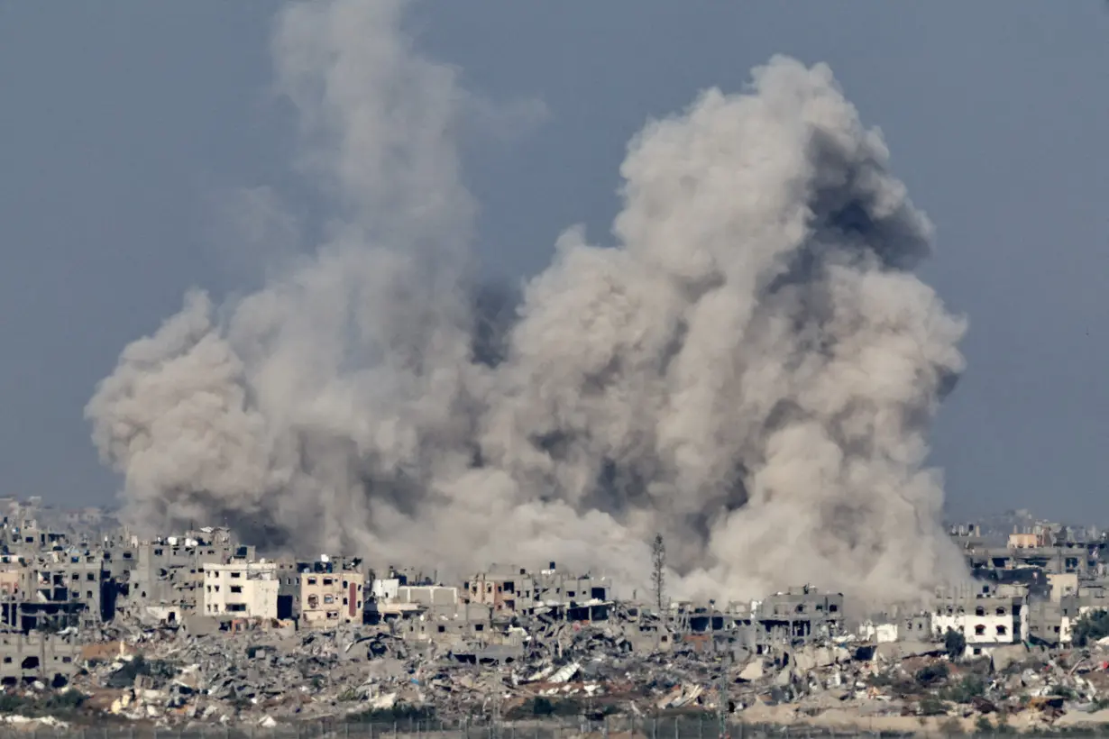 Smoke rises over Gaza, amid the ongoing conflict between Israel and the Palestinian Islamist group Hamas, as seen from southern Israel