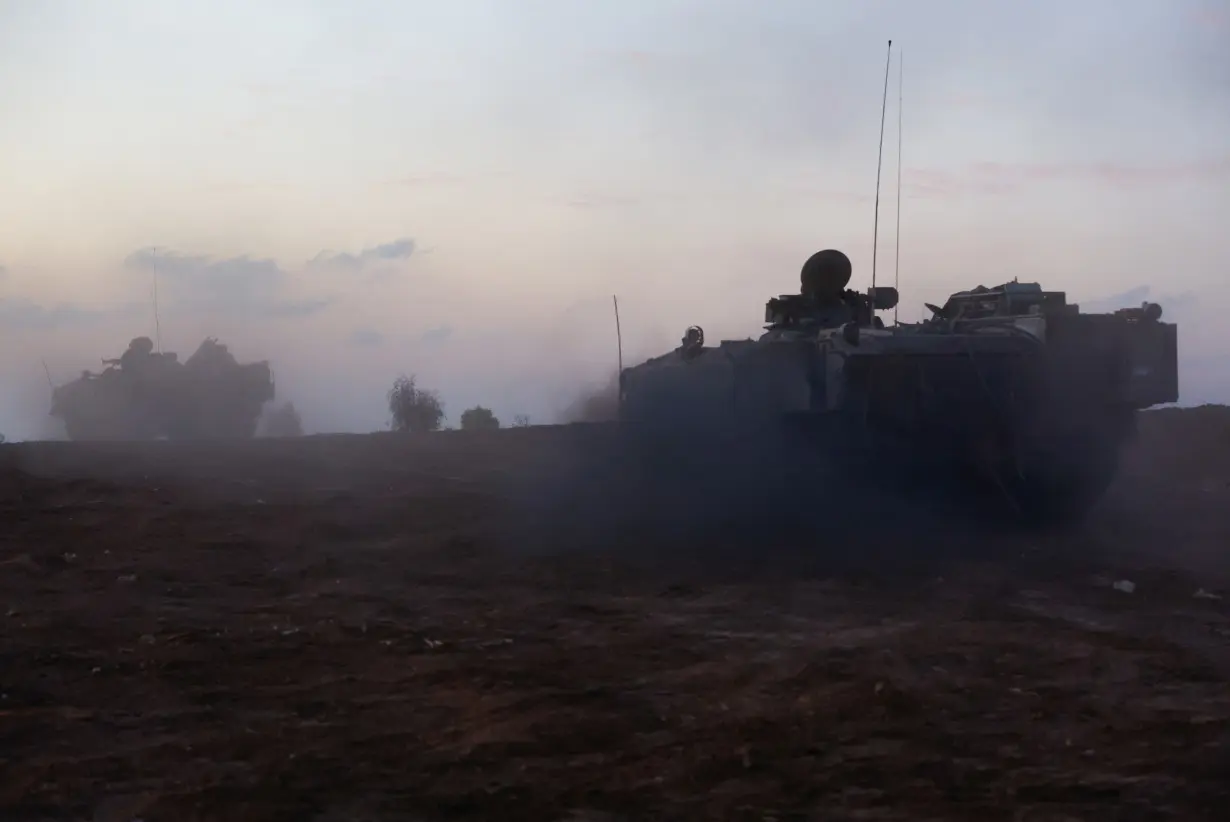 Israeli military operates, amid a temporary truce between Hamas and Israel, near Gaza