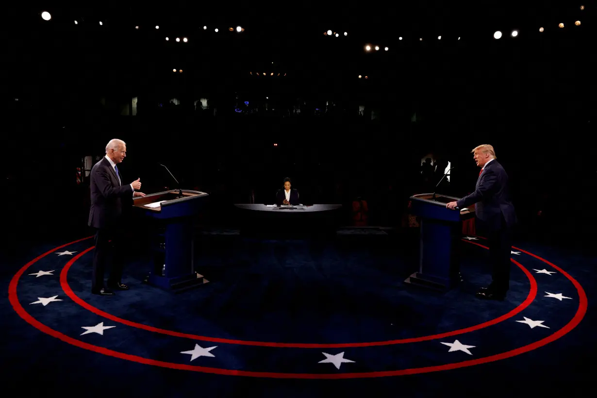 FILE PHOTO: President Trump and Democratic presidential nominee Biden participate in their second debate in Nashville