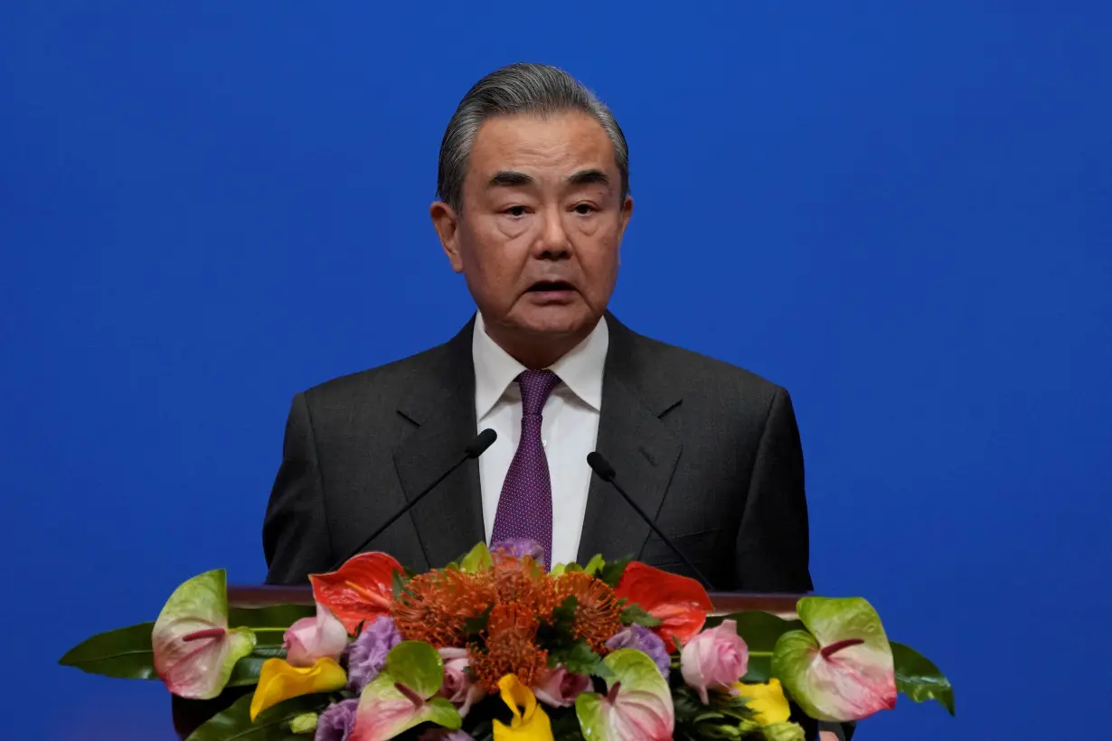 Chinese Foreign Minister Wang Yi speaks during a reception for Commemoration of the 45th Anniversary of China-U.S. Diplomatic Relations at the Diaoyutai Guest House in Beijing