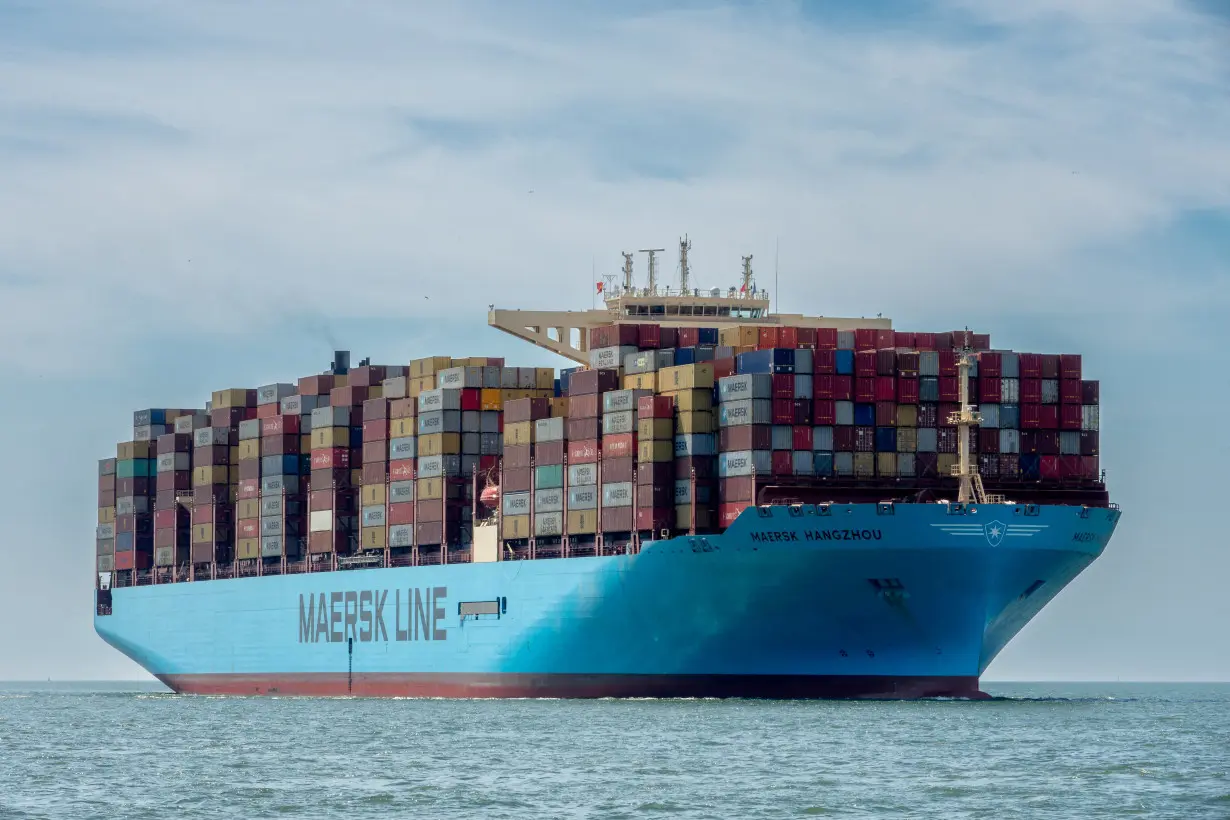 FILE PHOTO: Container vessel Maersk Hangzhou sails in the Wielingen channel