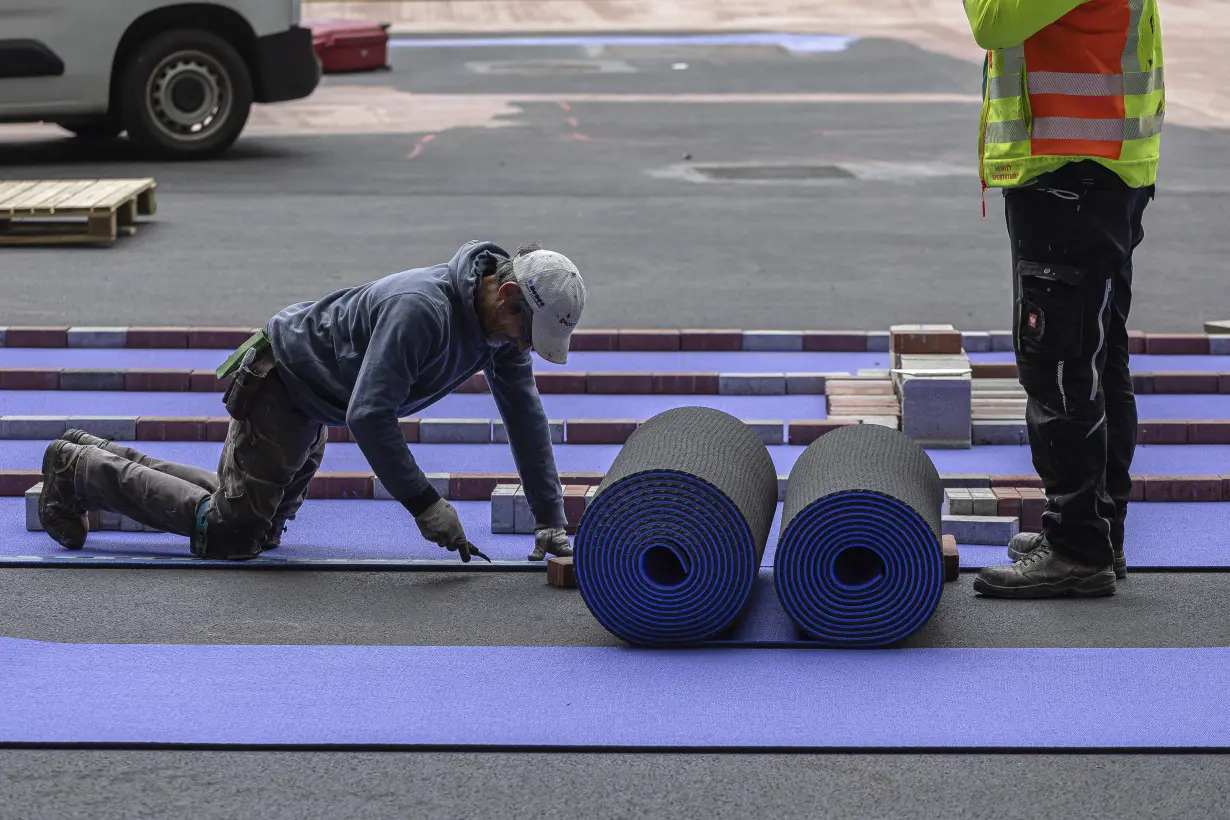 Seeing purple: Fans get a new track color and maybe record-breaking times at Paris Olympics