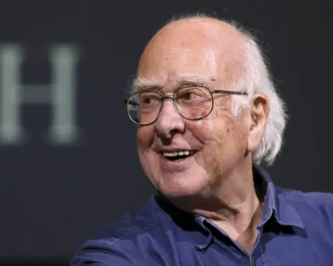 Peter Higgs, who proposed existence of Higgs boson particle, has died at 94, university says