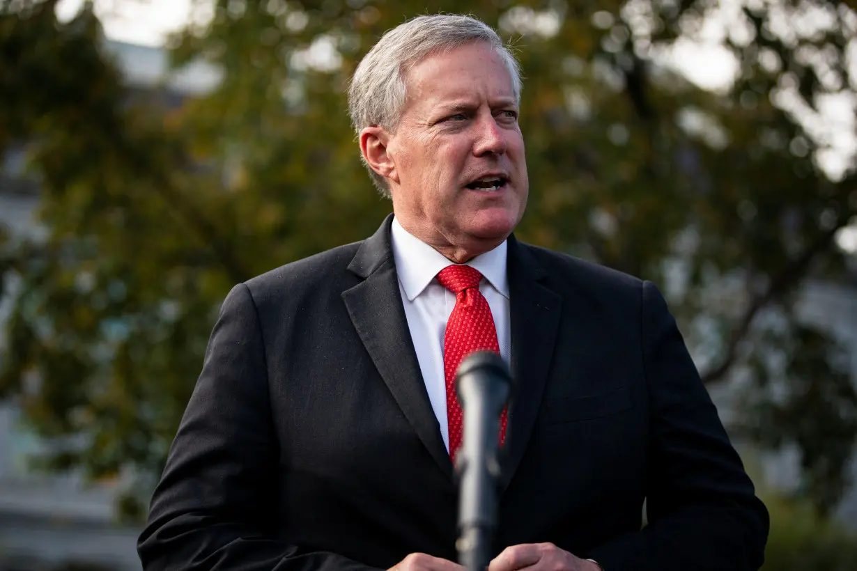 White House Chief of Staff Mark Meadows speaks to reporters following a television interview, outside the White House