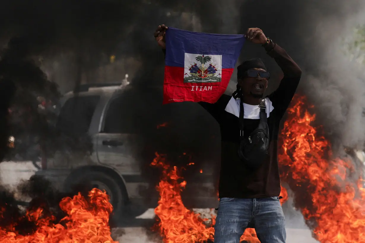 FILE PHOTO: People demonstrate against the government and insecurity in Port-au-Prince