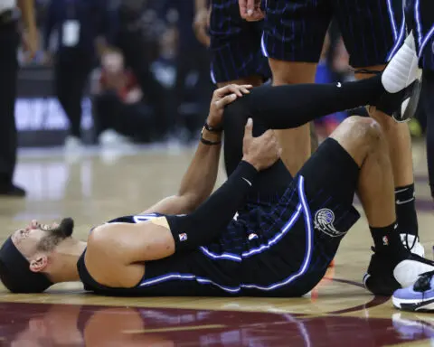 Orlando Magic guard Jalen Suggs helped off with left leg injury in Game 2 against Cavaliers