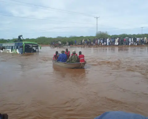 A rescue operation is taking place in northern Kenya after floodwaters swept a bus away