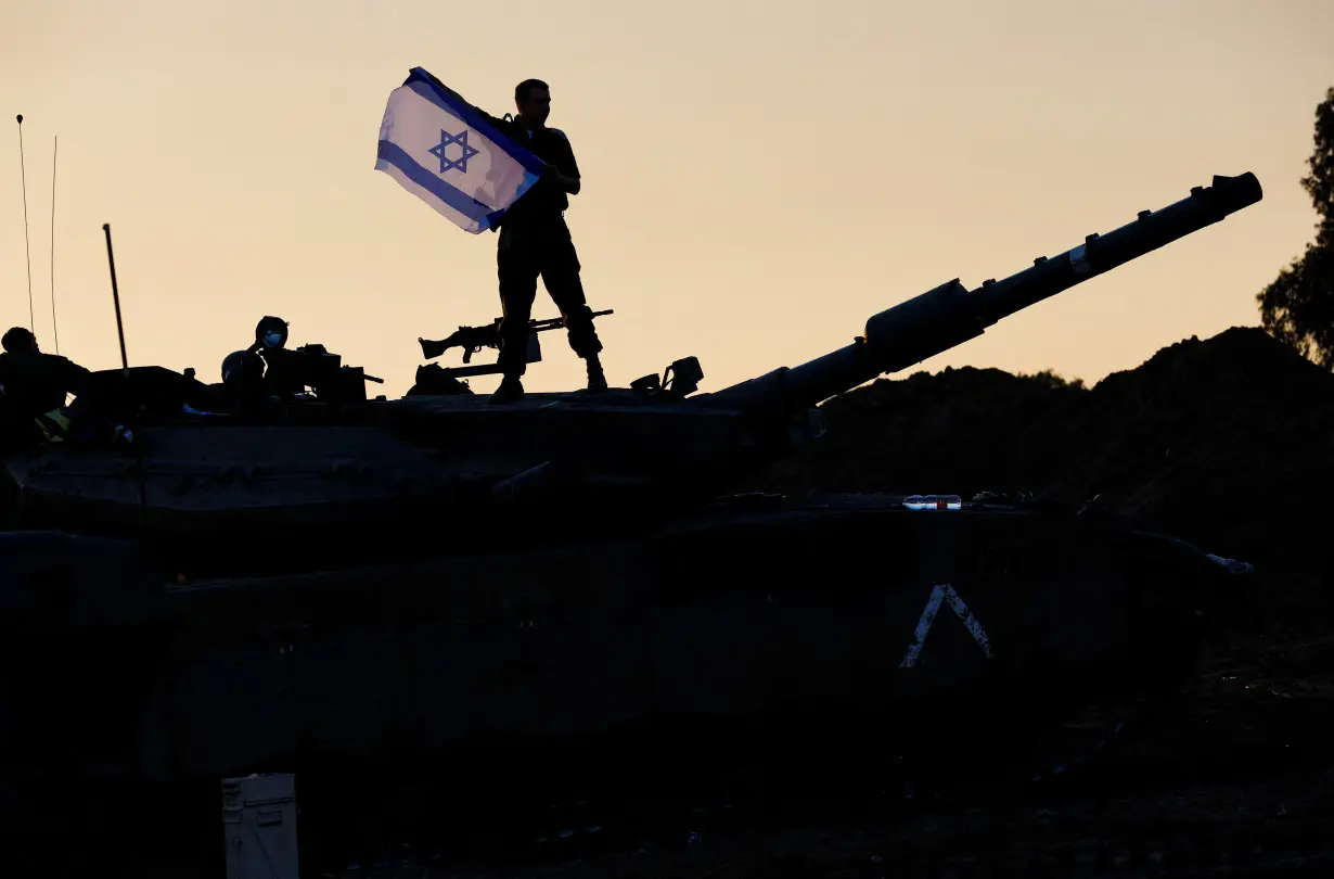 Israeli military operates near the border with Gaza, during a temporary truce between Israel and Palestinian Islamist group Hamas