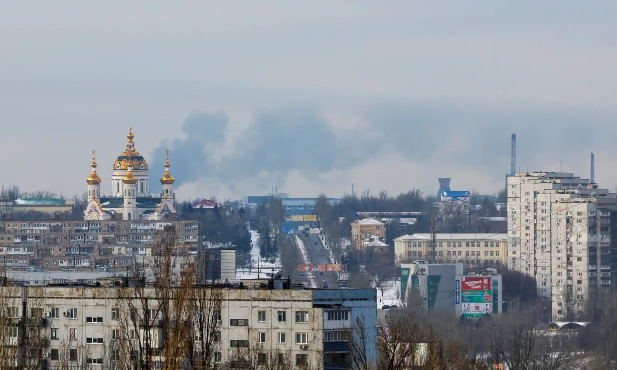 Smoke rises above the city of Donetsk