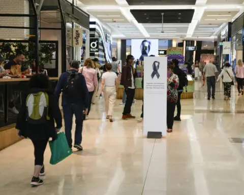 Staff and shoppers return to 'somber' Sydney shopping mall 6 days after mass stabbings